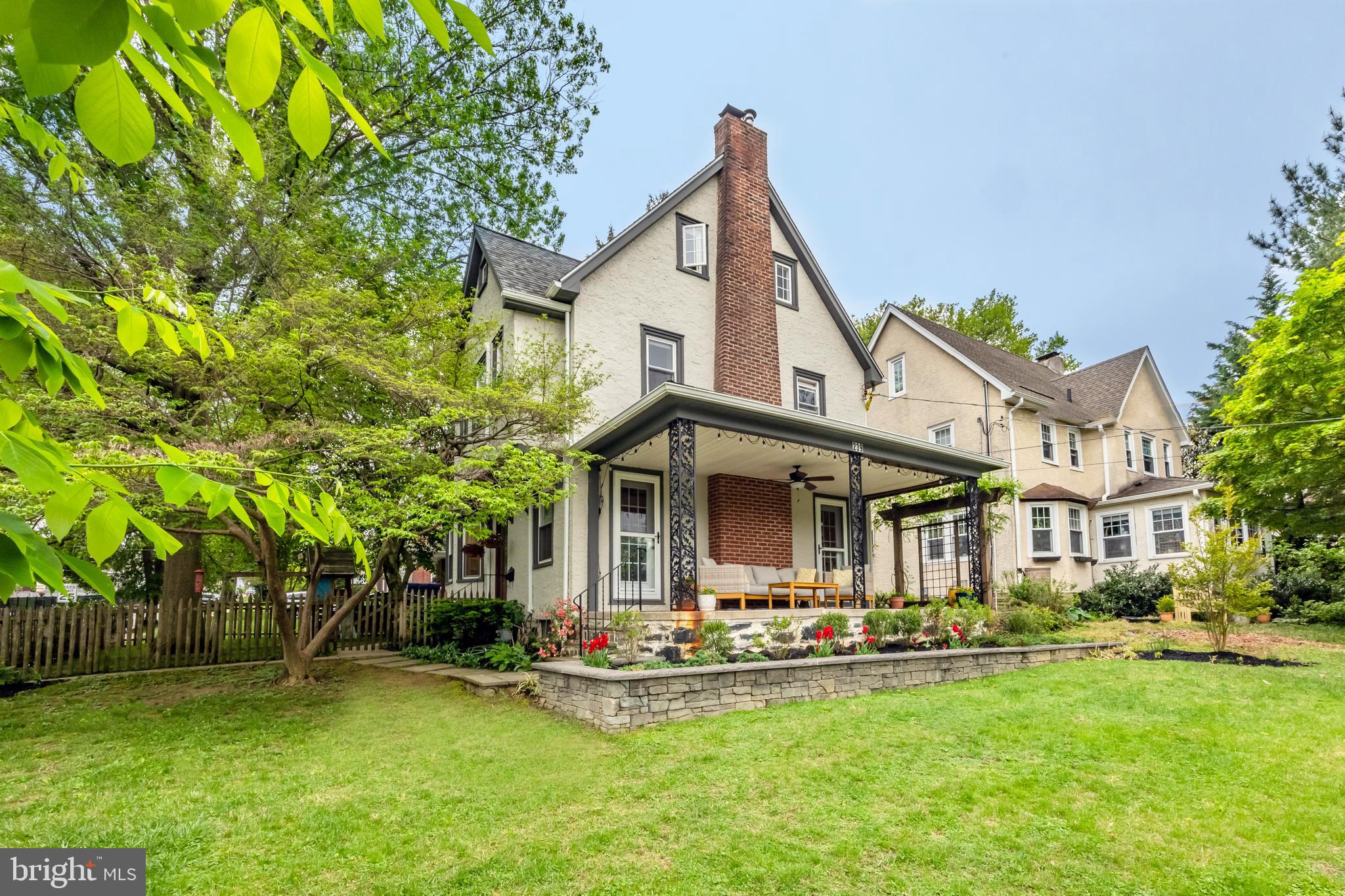 239 Cherry Lane Havertown, PA 19083 - Photo 45 of 49 a front view of a house with swimming pool having outdoor seating