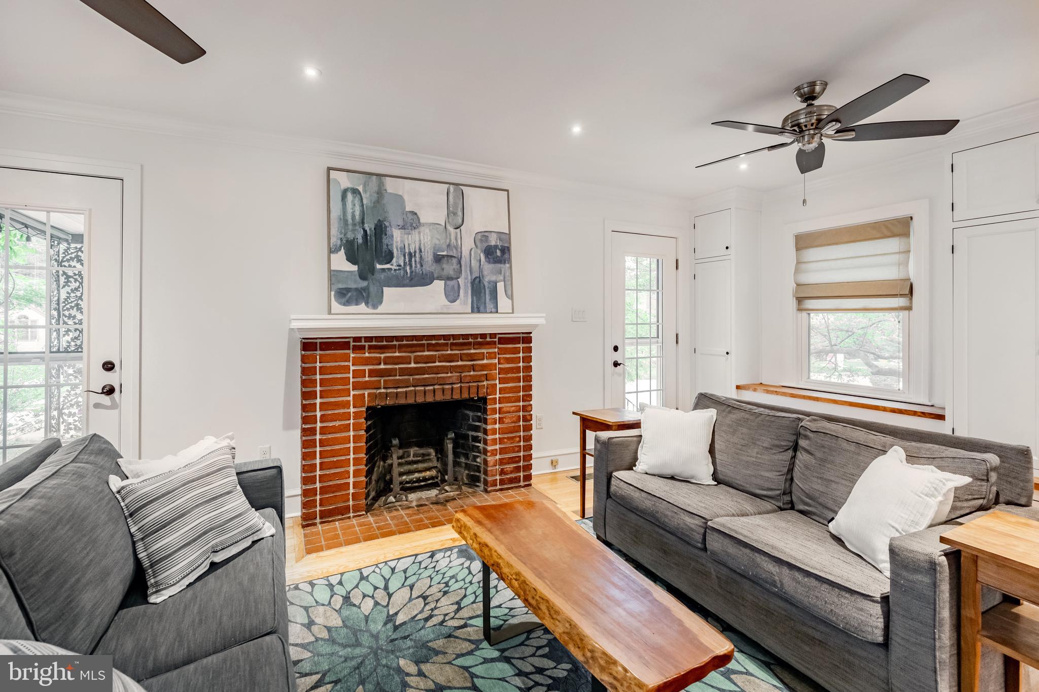 239 Cherry Lane Havertown, PA 19083 - Photo 6 of 49 a living room with furniture and a fireplace
