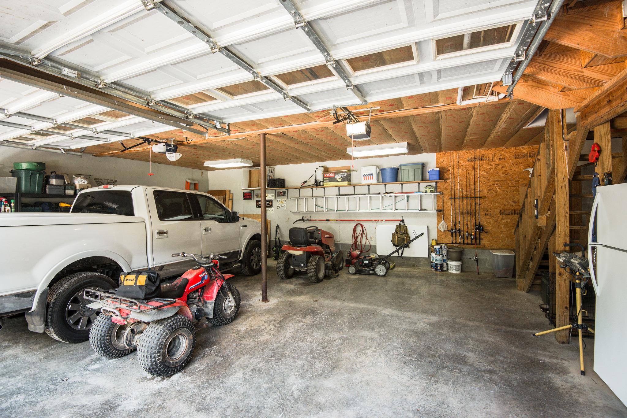 410 Baker Road Dickson, TN 37055 - Photo 30 of 30 a view of a garage with a white car parked