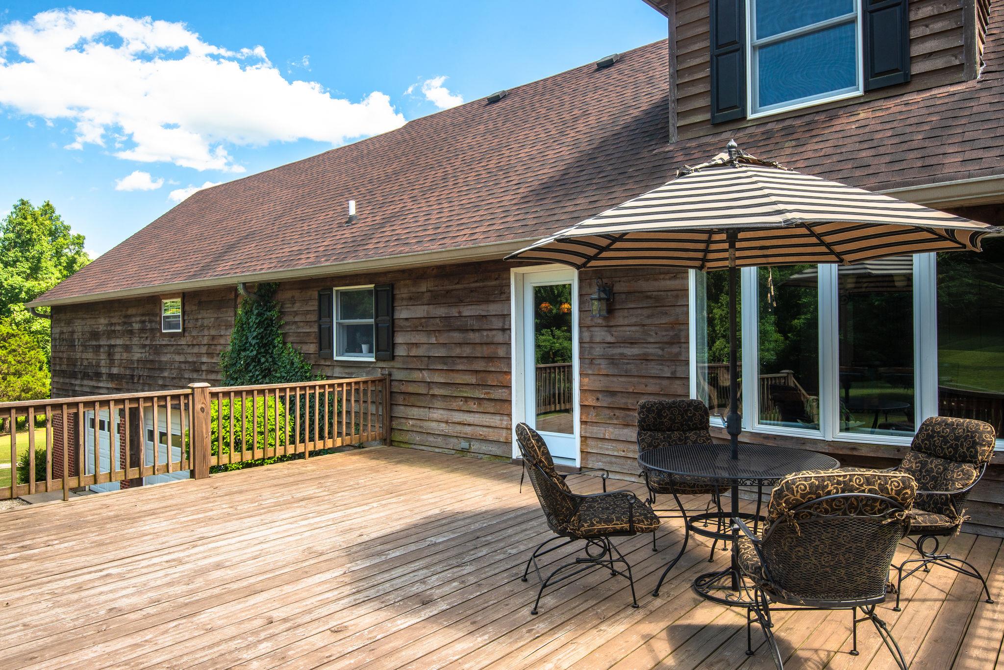410 Baker Road Dickson, TN 37055 - Photo 5 of 30 a patio with table and chairs