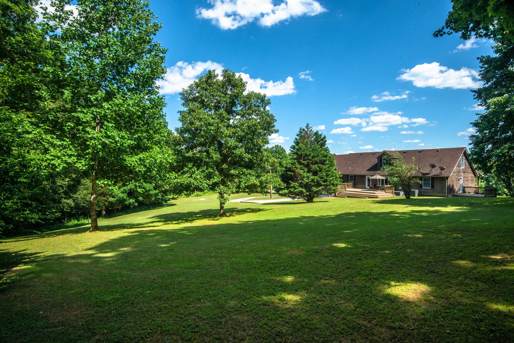 410 Baker Road Dickson, TN 37055 - Photo 6 of 30 a view of a golf course with a lake view