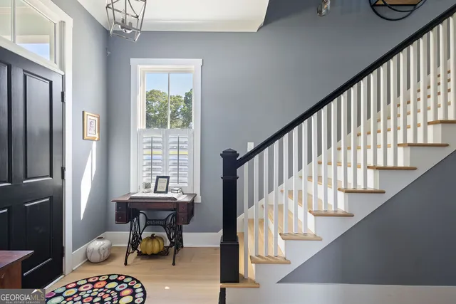 a view of an entryway with staircase