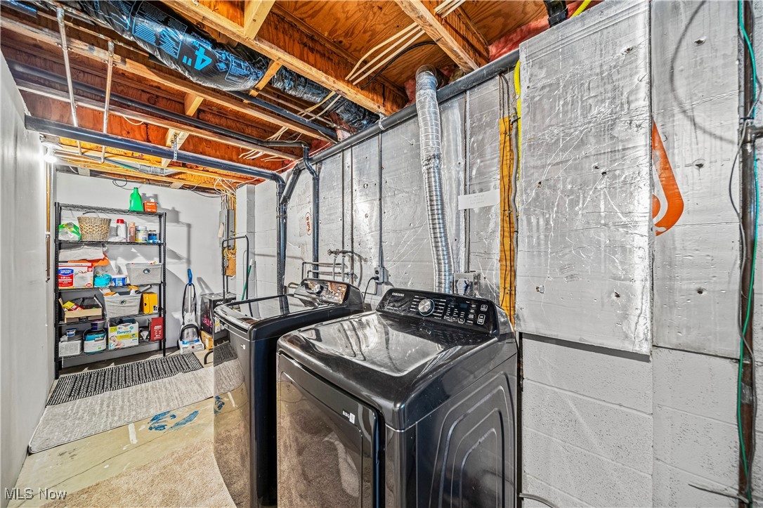2959 Reeves Road Willoughby, OH 44094 - Photo 25 of 32 Laundry room featuring washing machine and dryer