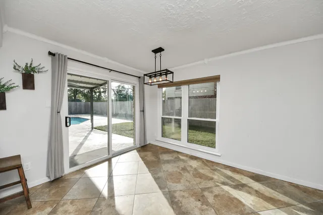 a view of an empty room and window