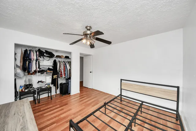 a view of a living room and wooden floor