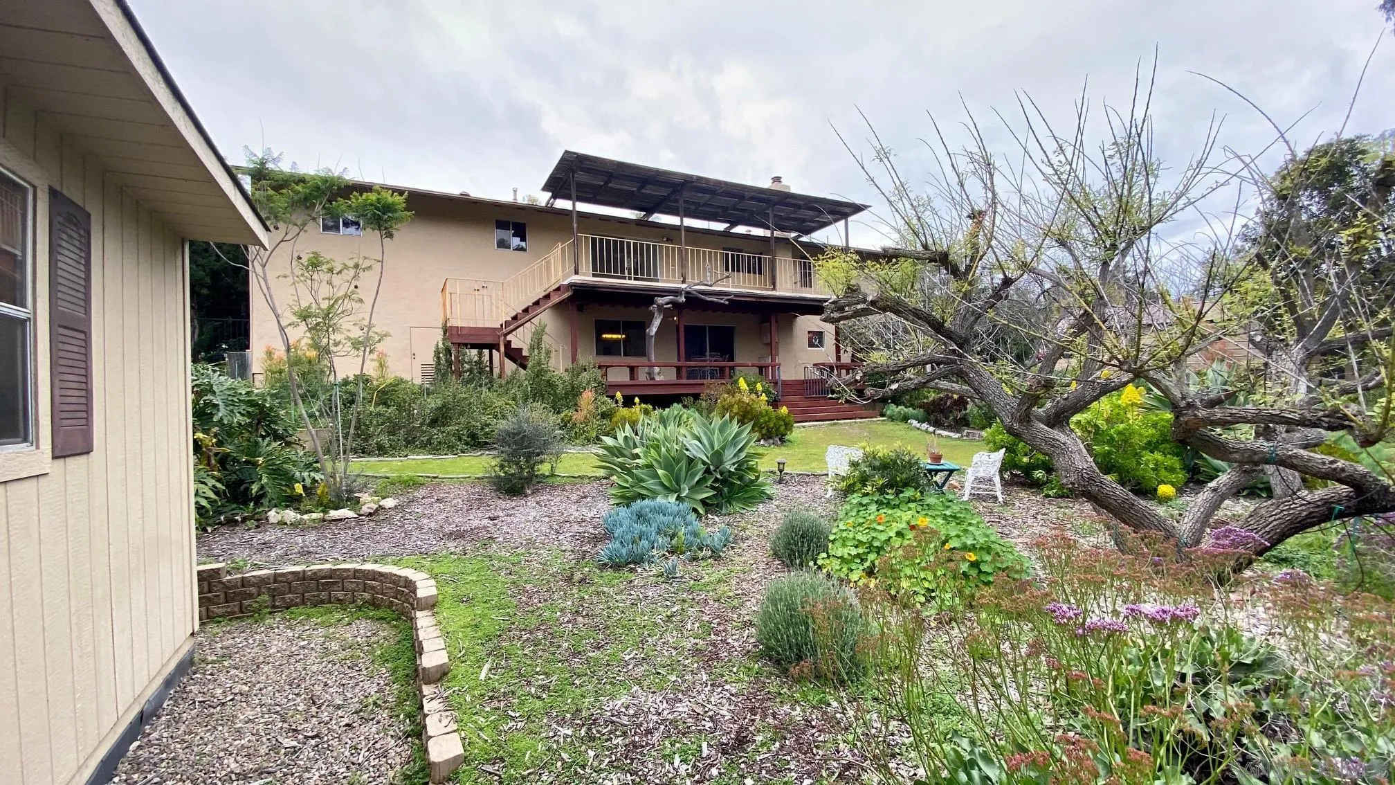 4351 Crestview Drive La Mesa, CA 91941 - Photo 13 of 49 a front view of a house with garden