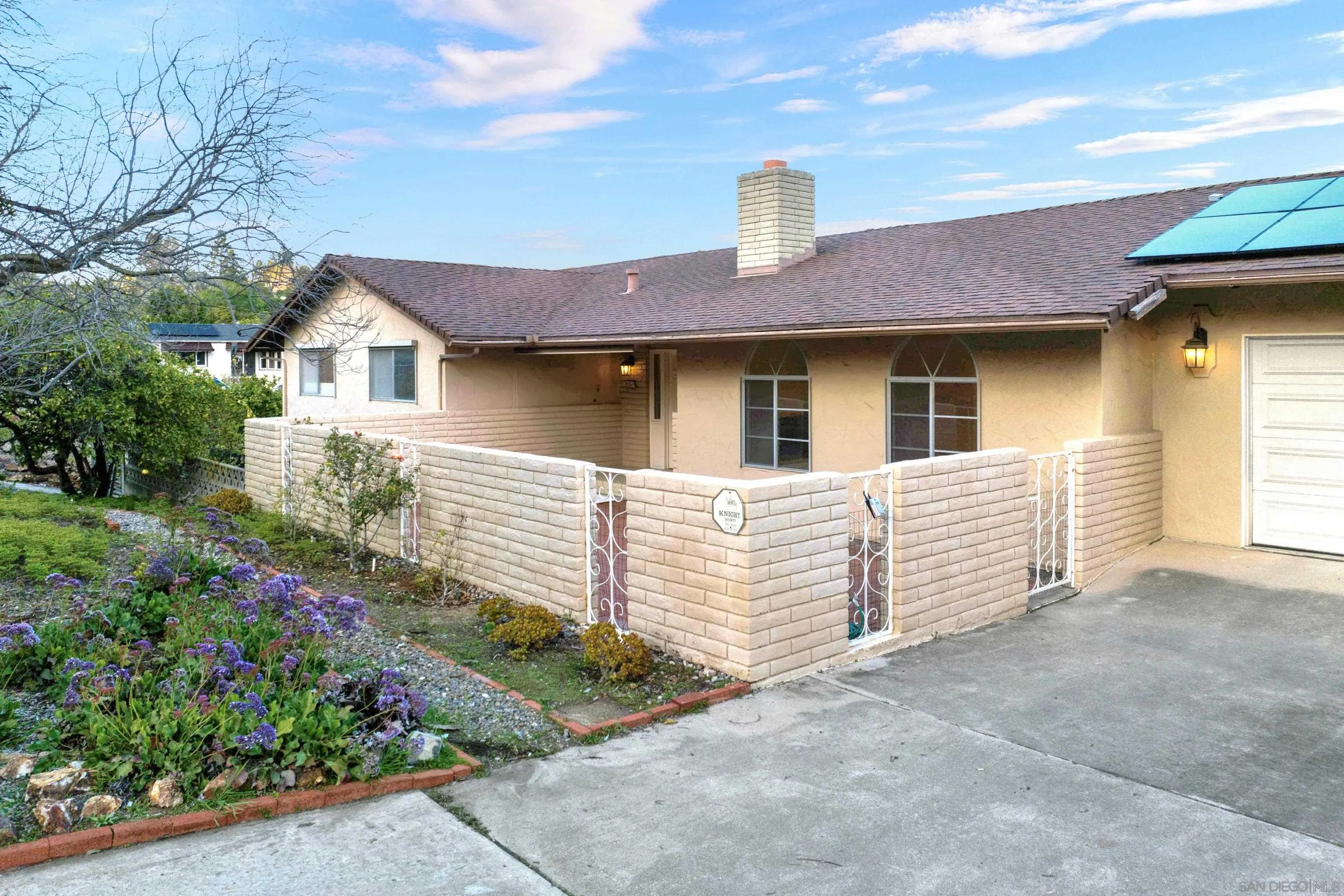 4351 Crestview Drive La Mesa, CA 91941 - Photo 2 of 49 a front view of a house with a garage