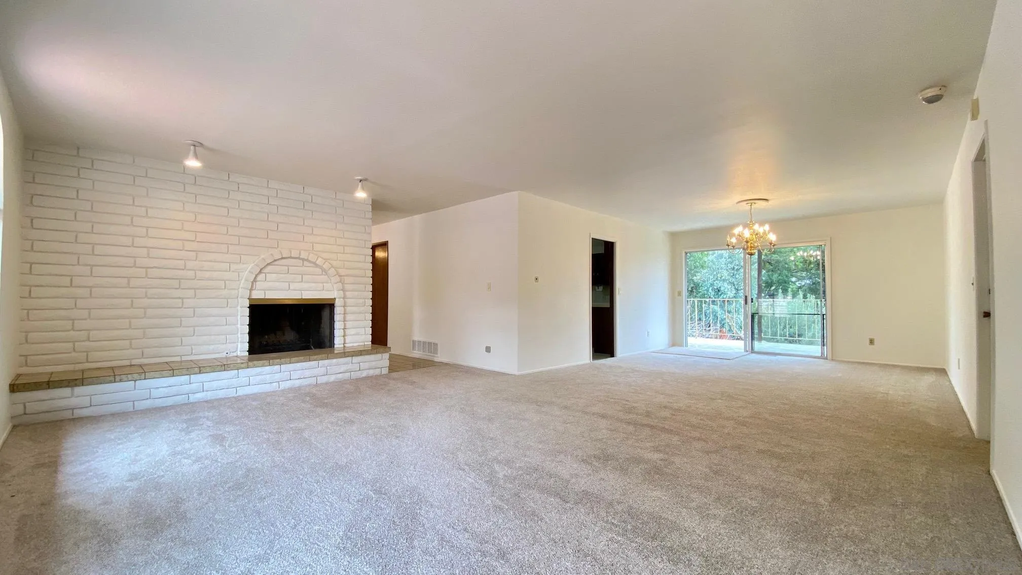 4351 Crestview Drive La Mesa, CA 91941 - Photo 23 of 49 a view of a livingroom with a fireplace and window
