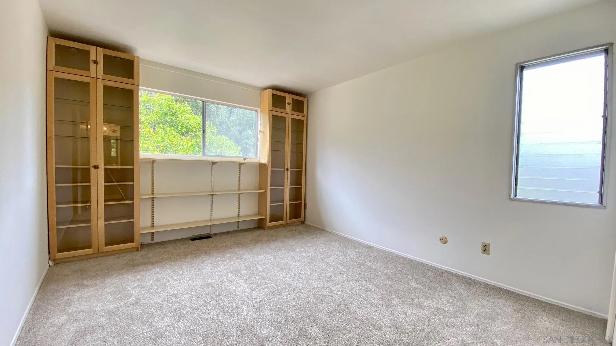 4351 Crestview Drive La Mesa, CA 91941 - Photo 27 of 49 an empty room with windows