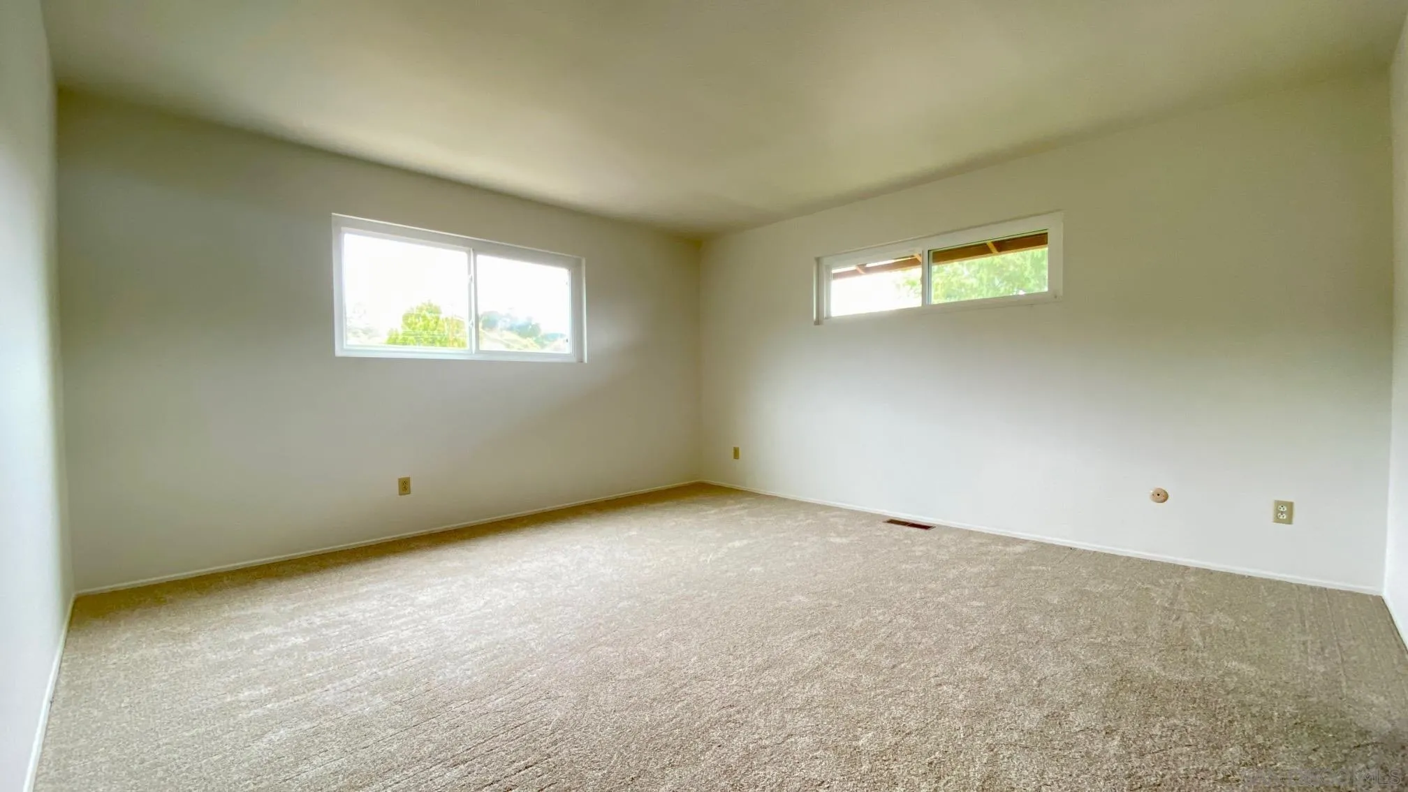 4351 Crestview Drive La Mesa, CA 91941 - Photo 28 of 49 an empty room with windows