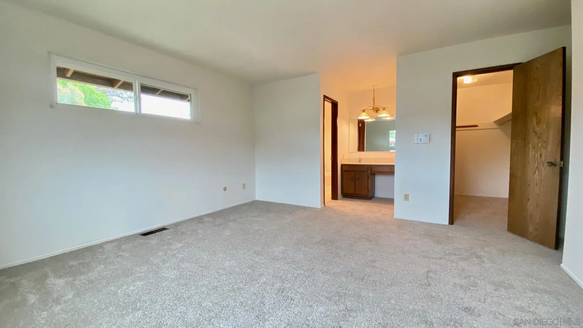 4351 Crestview Drive La Mesa, CA 91941 - Photo 29 of 49 a view of empty room with a fireplace