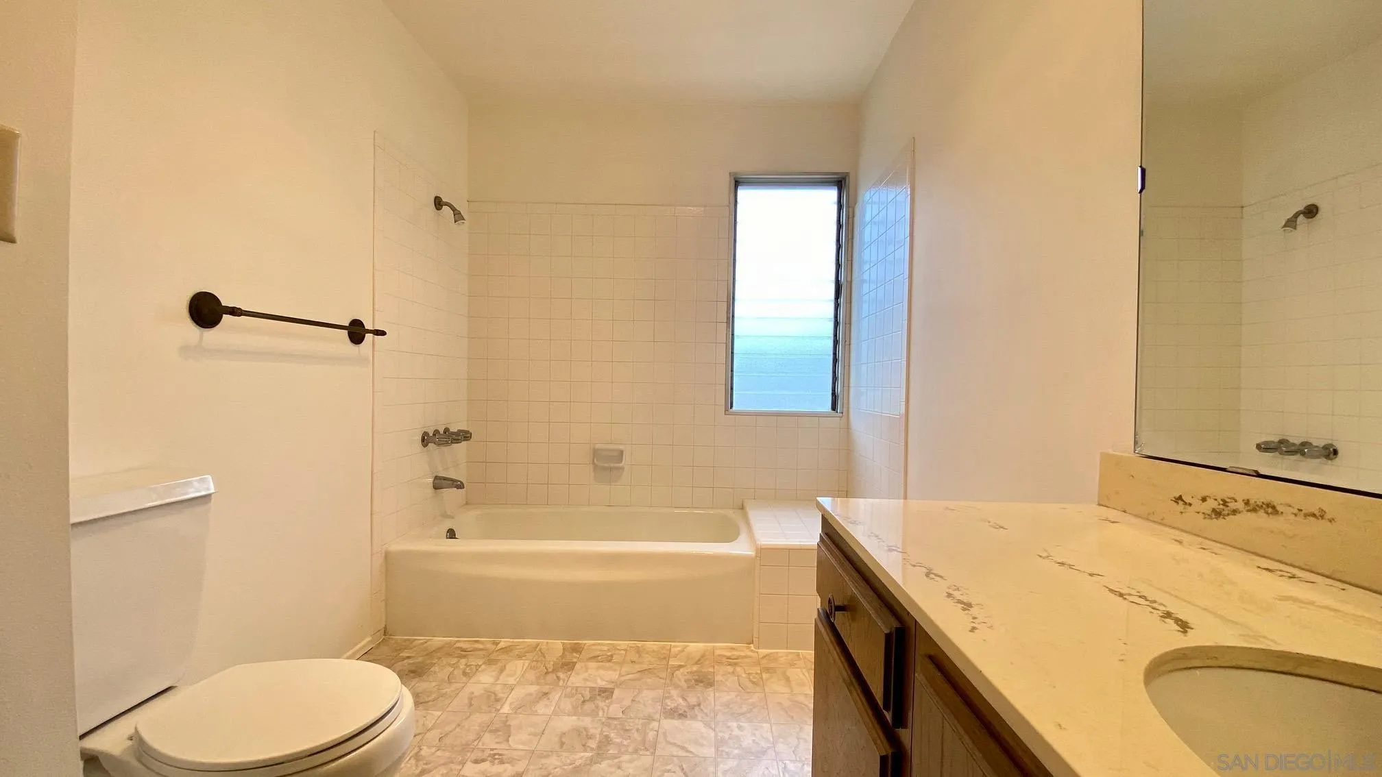 4351 Crestview Drive La Mesa, CA 91941 - Photo 30 of 49 a bathroom with a granite countertop sink toilet and shower