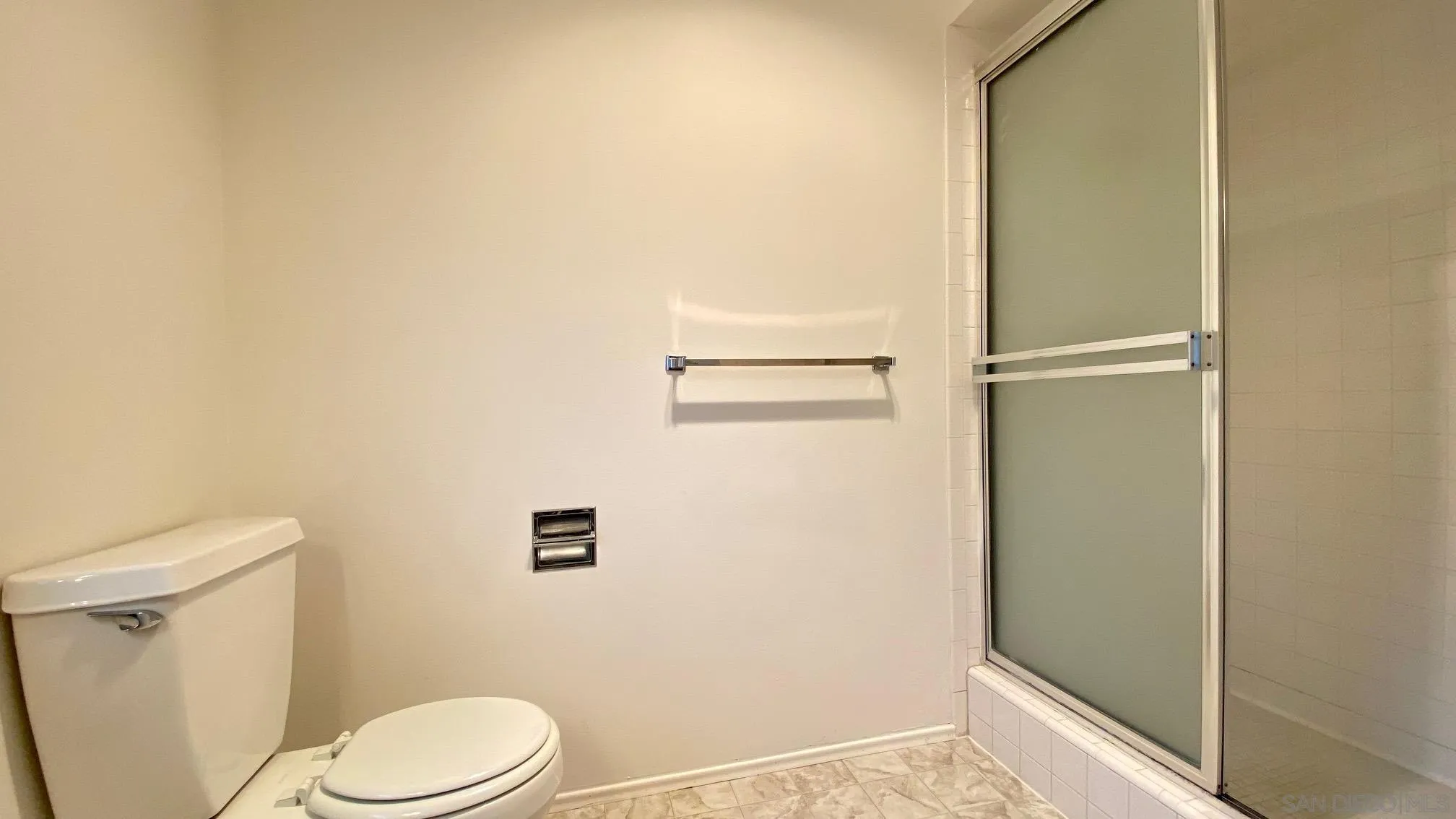 4351 Crestview Drive La Mesa, CA 91941 - Photo 32 of 49 a white toilet sitting next to a shower