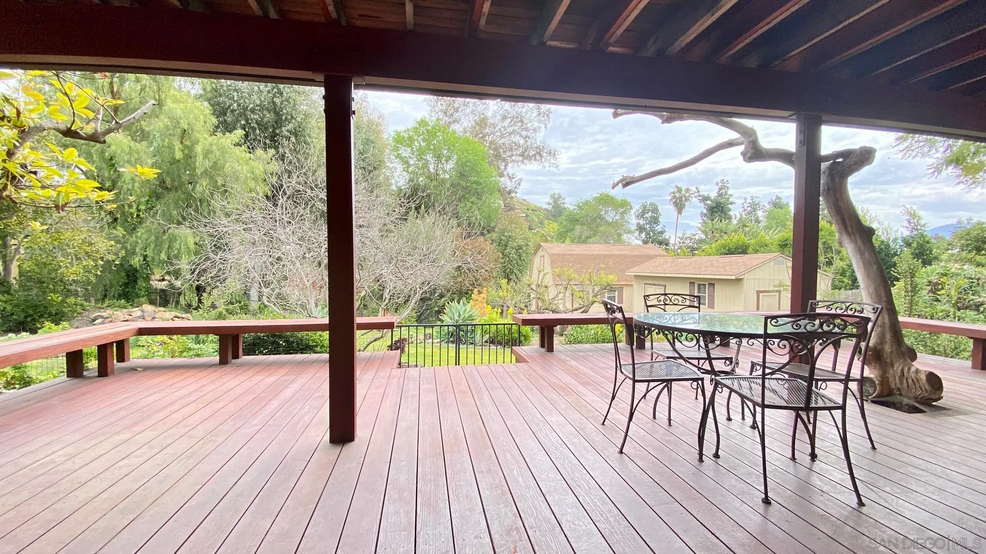 4351 Crestview Drive La Mesa, CA 91941 - Photo 36 of 49 a view of a patio with a table chairs and a patio