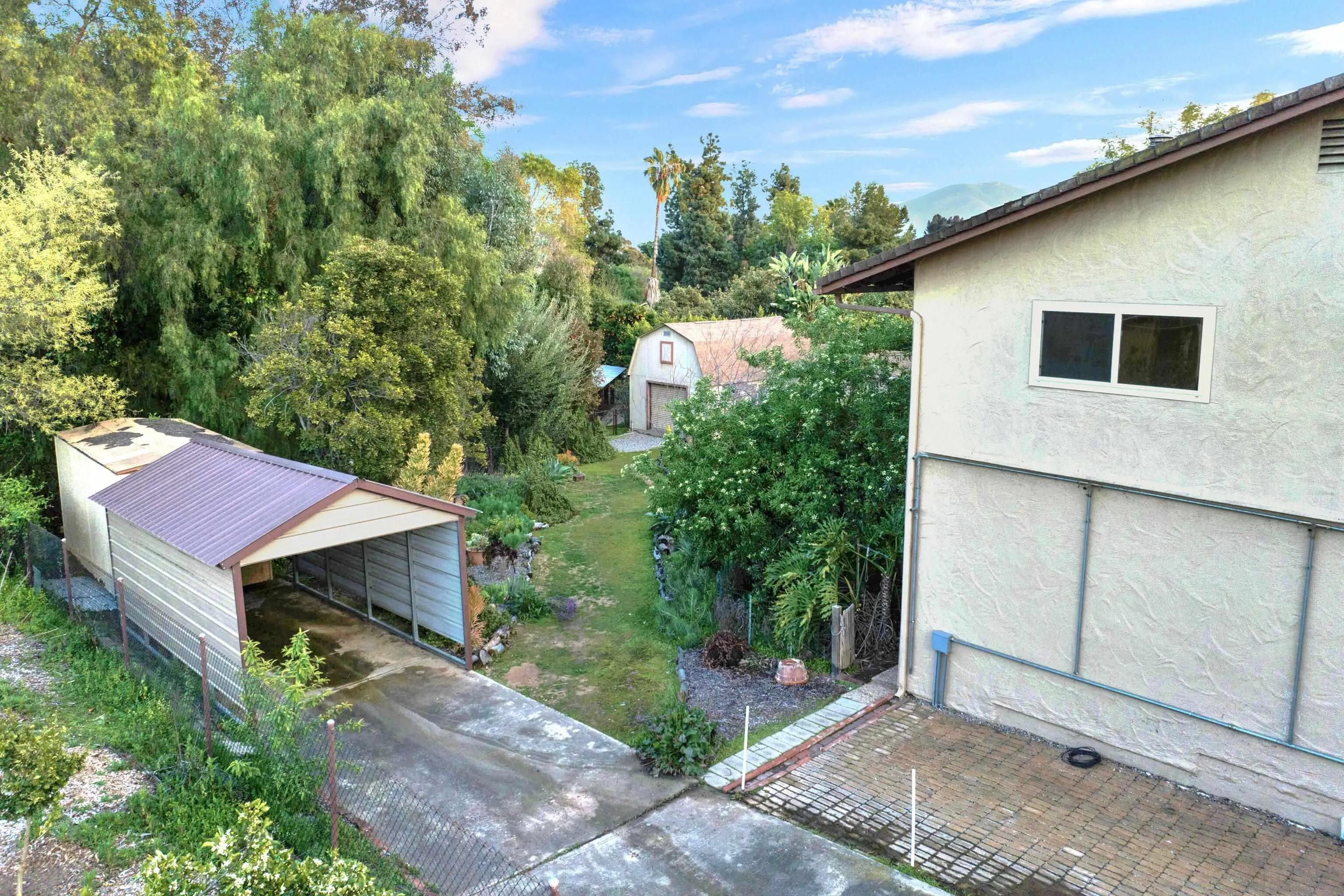 4351 Crestview Drive La Mesa, CA 91941 - Photo 8 of 49 a backyard of a house with table and chairs