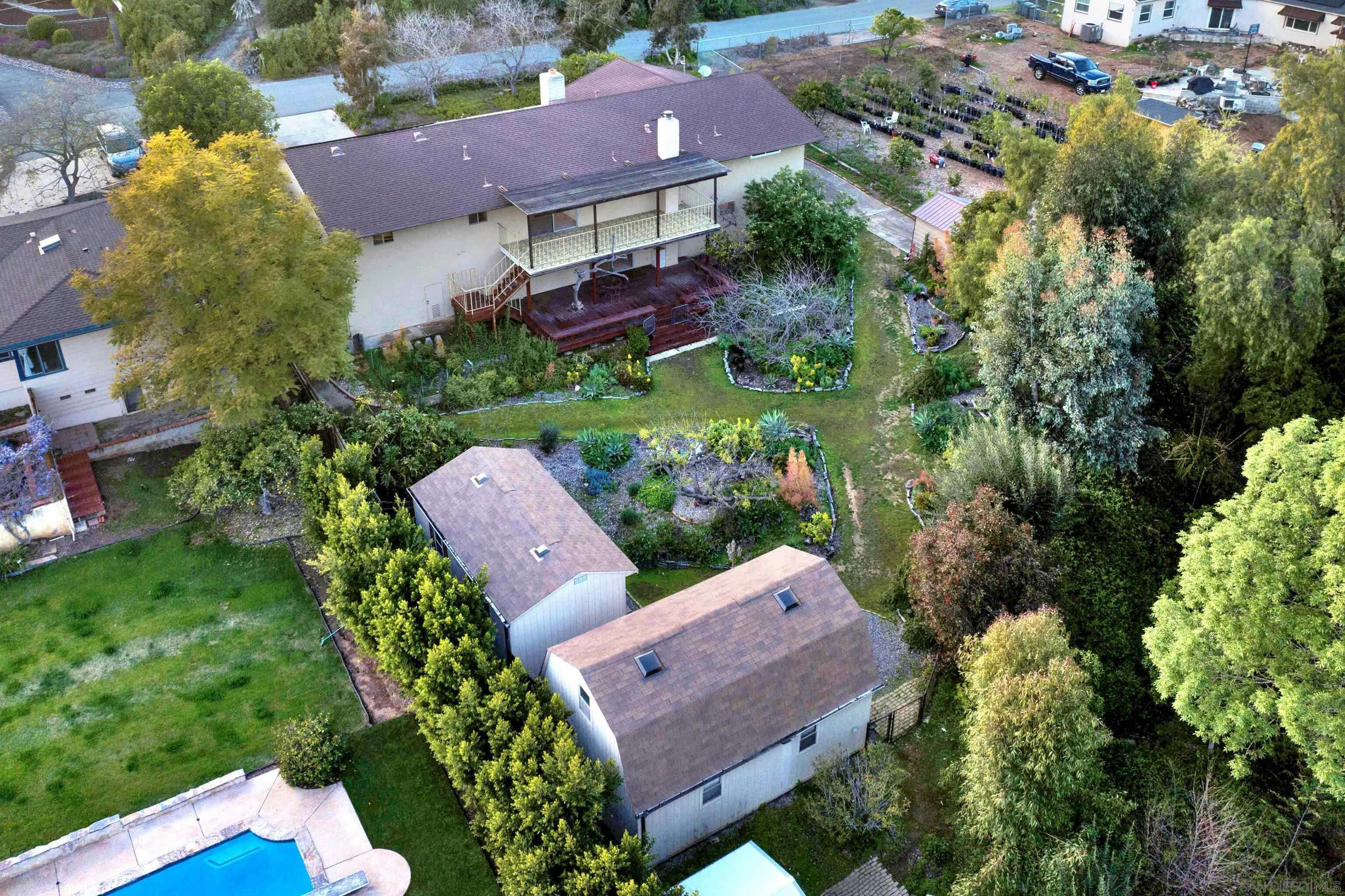 4351 Crestview Drive La Mesa, CA 91941 - Photo 10 of 49 an aerial view of a house with a garden and lake view
