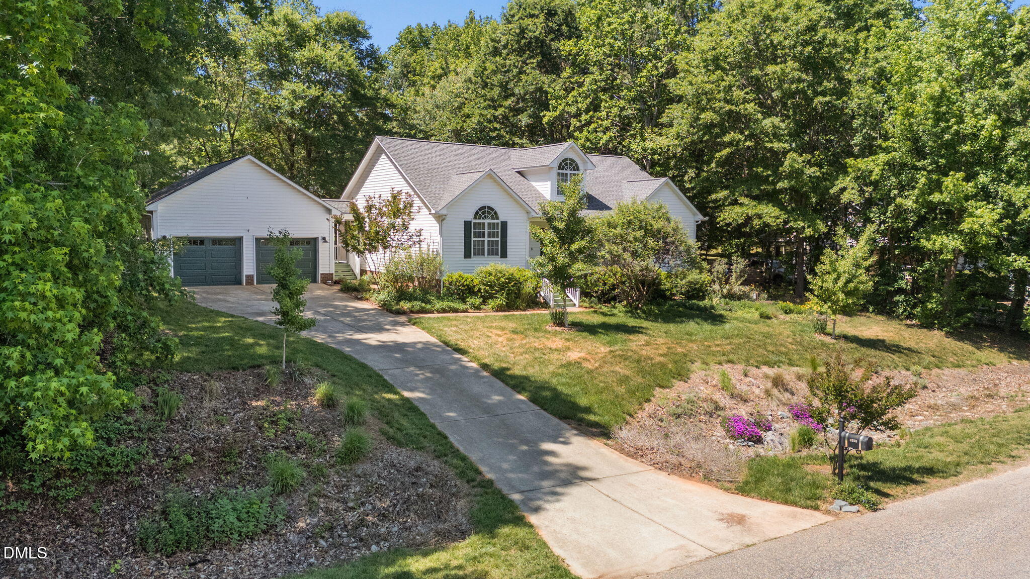 6820 Oviedo Drive Raleigh, NC 27603 - Photo 48 of 50 a front view of a house with a yard