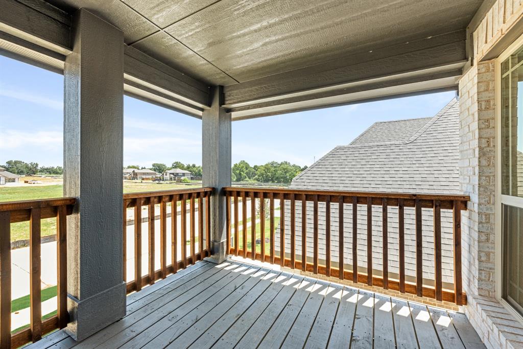 717 Seahawk Street Joshua, TX 76058 - Photo 26 of 40 a view of balcony with wooden floor