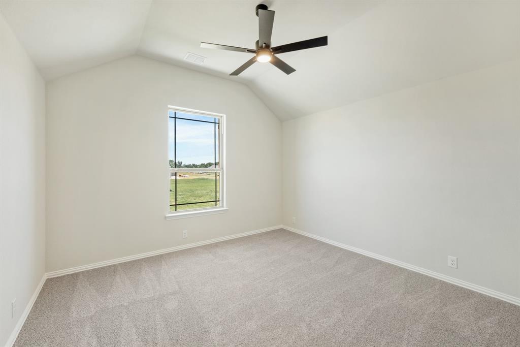 717 Seahawk Street Joshua, TX 76058 - Photo 32 of 40 a view of an empty room with a window