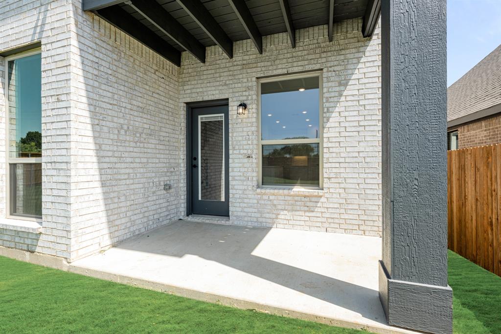 717 Seahawk Street Joshua, TX 76058 - Photo 38 of 40 a view of house and front door