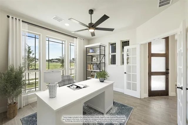 a living room with furniture a table and a large window