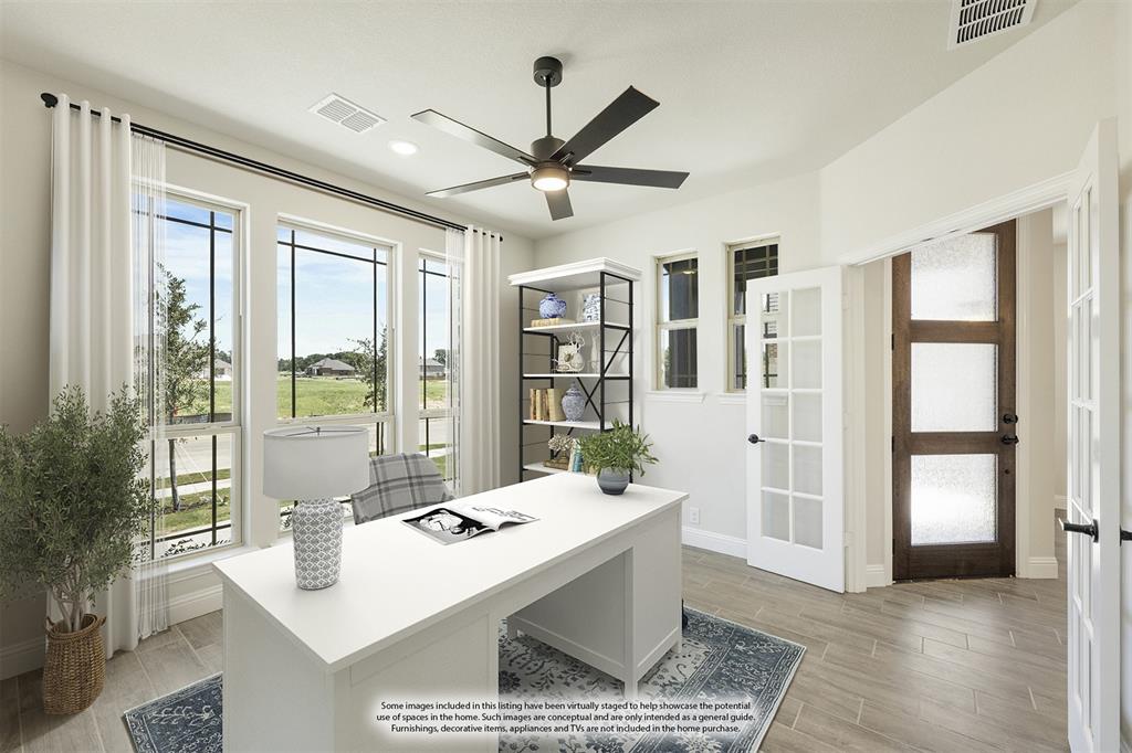 717 Seahawk Street Joshua, TX 76058 - Photo 6 of 40 a living room with furniture a table and a large window