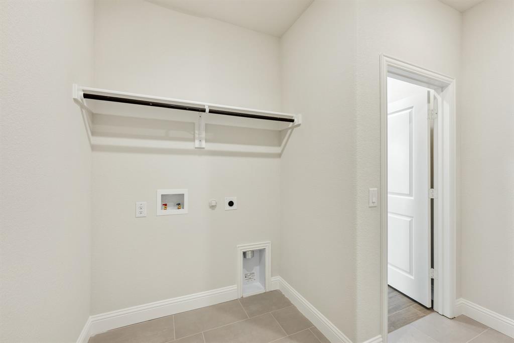 717 Seahawk Street Joshua, TX 76058 - Photo 10 of 40 a view of an empty walk in closet