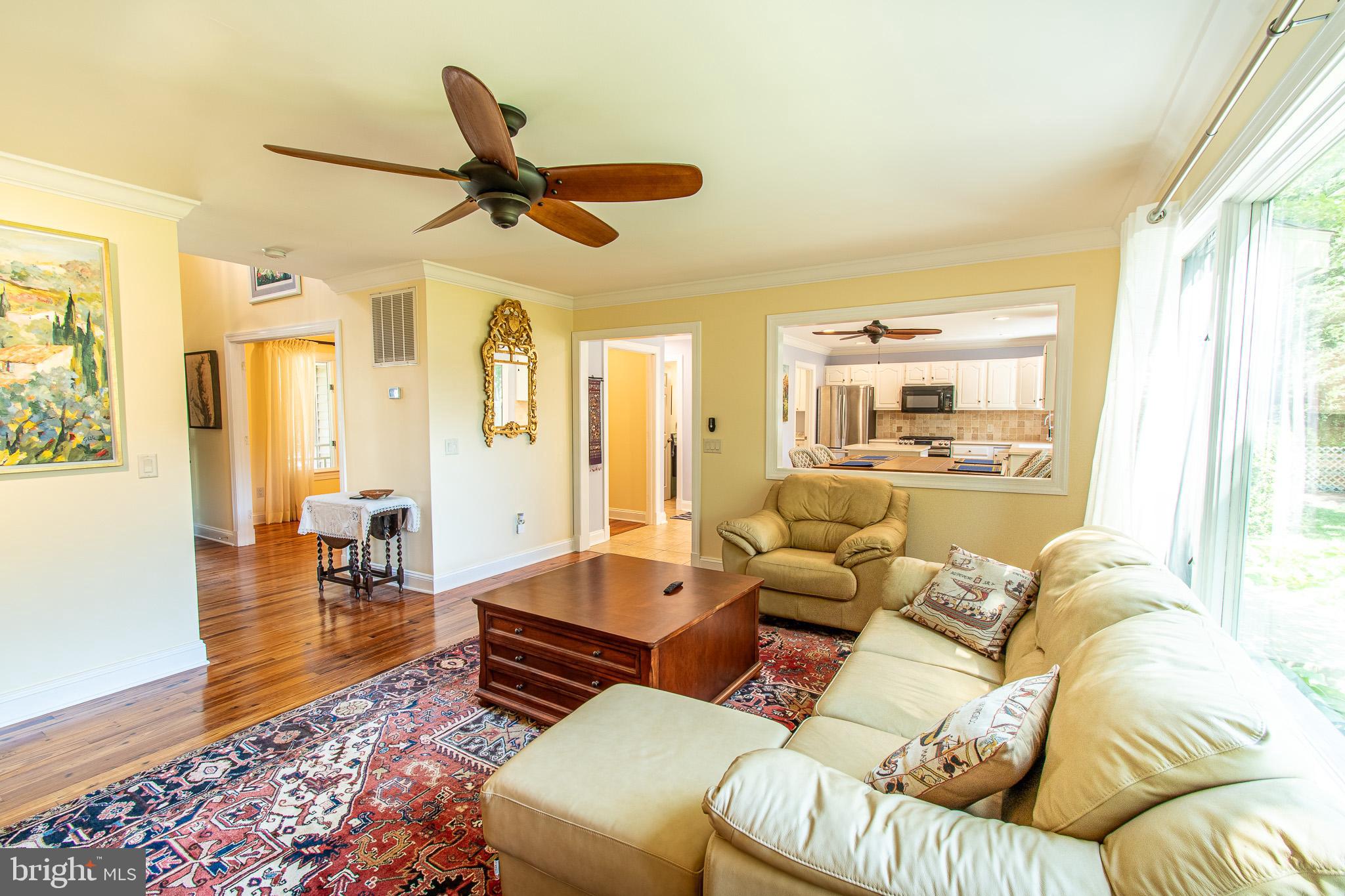 102 Jacks Point Road Oxford, MD 21654 - Photo 28 of 83 a living room with furniture ceiling fan and a rug