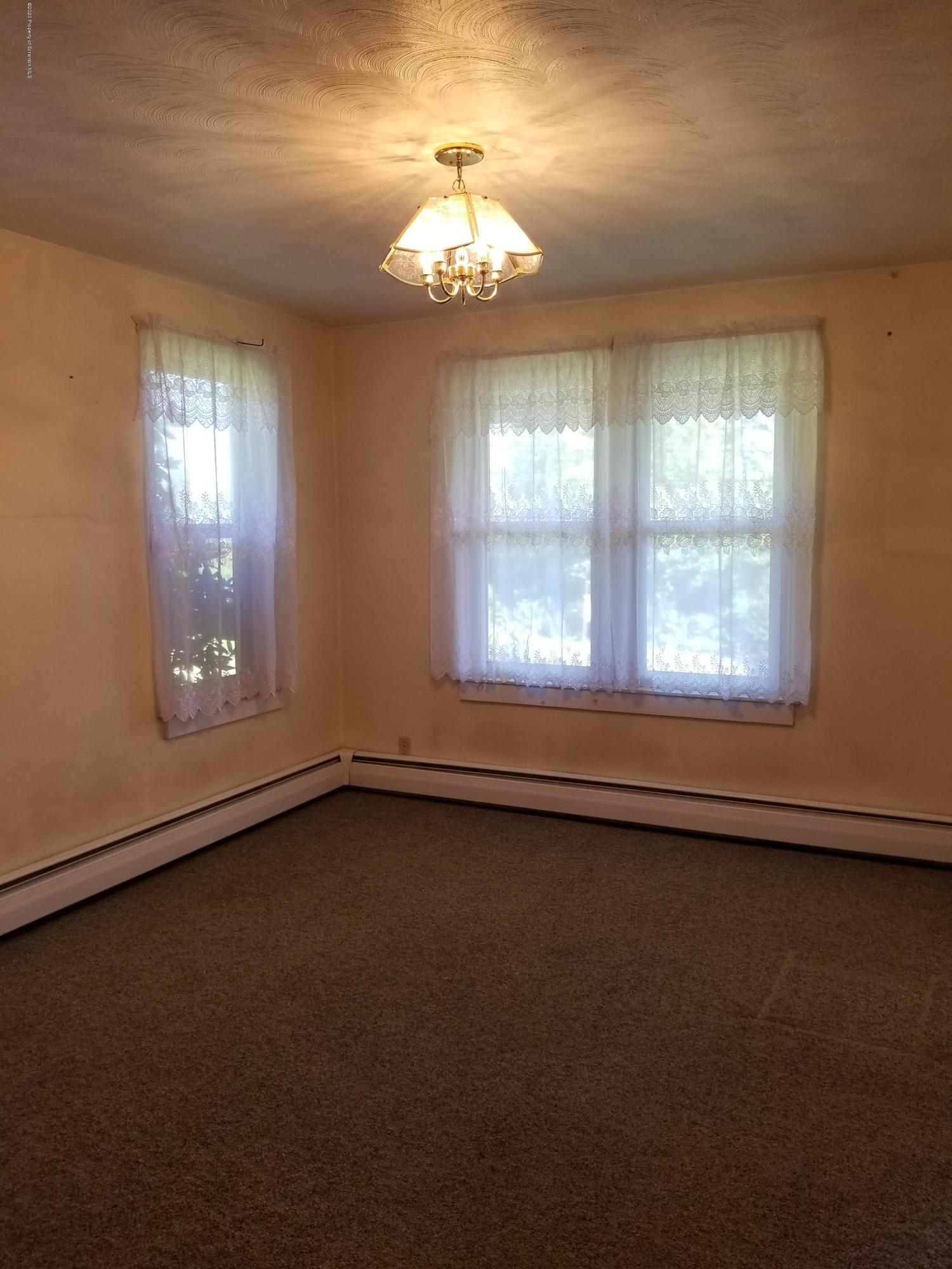 1265 Bendix Road Montrose, PA 18801 - Photo 7 of 20 a view of an empty room with a window