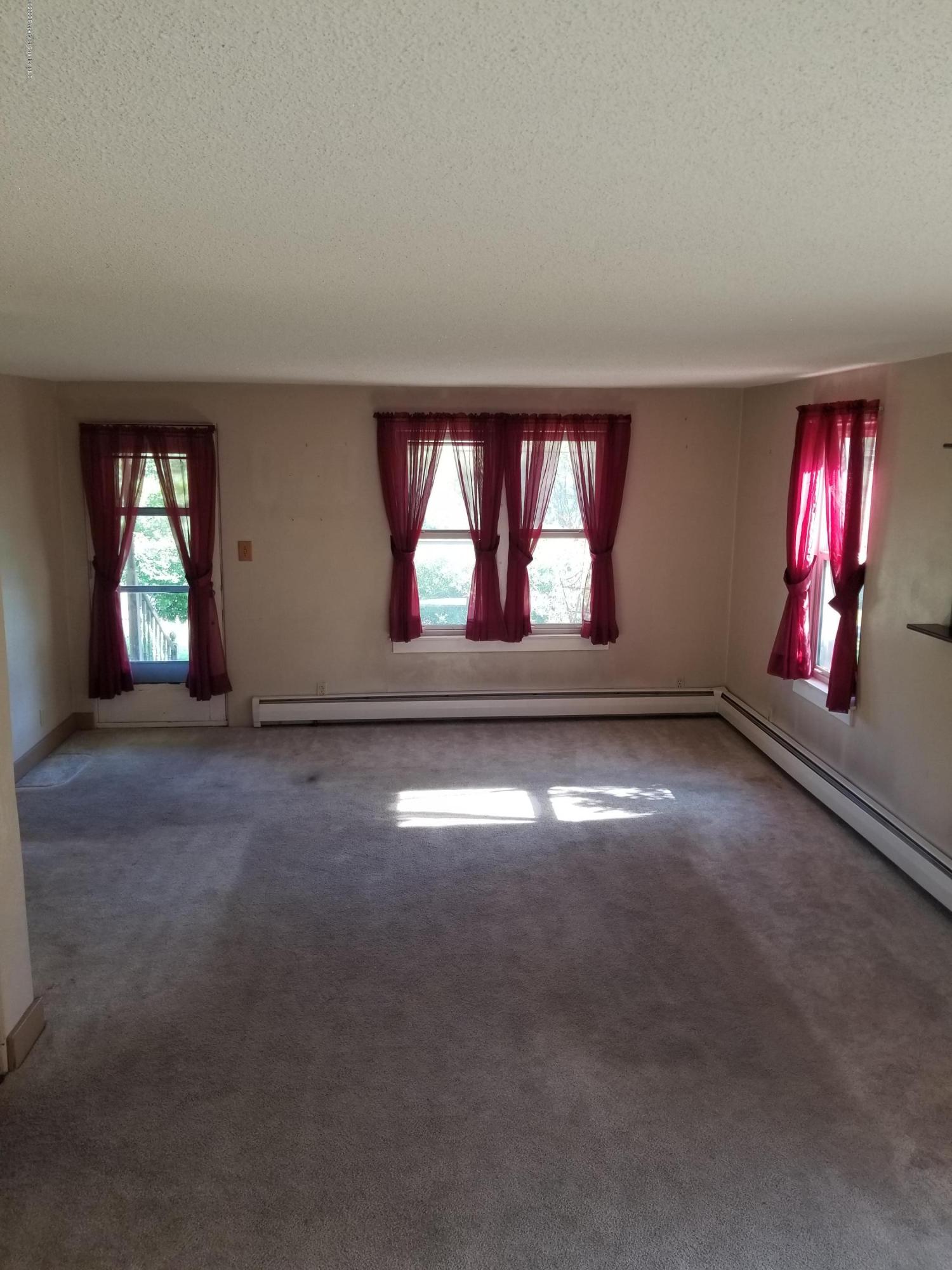 1265 Bendix Road Montrose, PA 18801 - Photo 9 of 20 an empty room with windows and closet