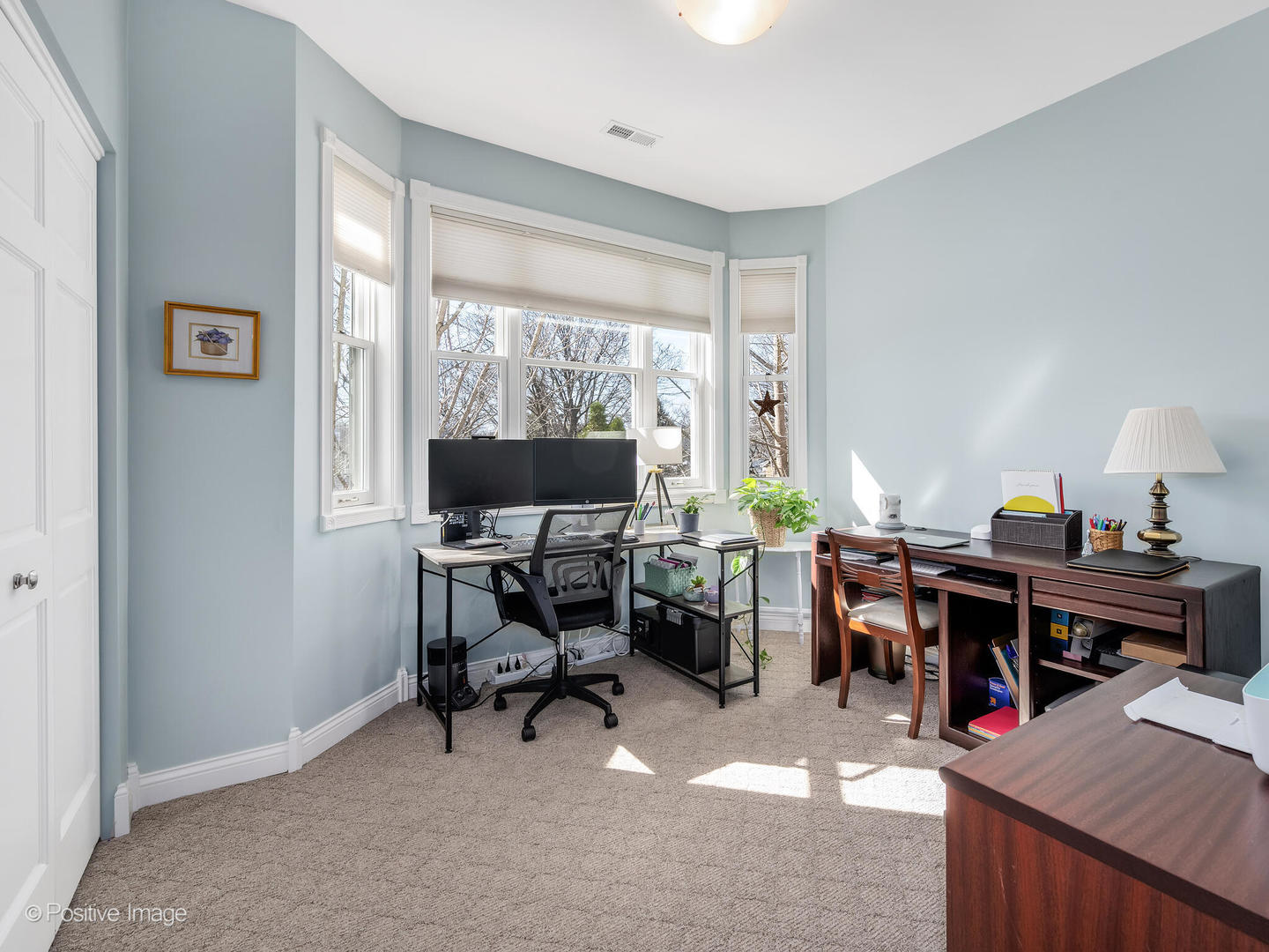1607 East Indiana Street Wheaton, IL 60187 - Photo 24 of 31 a view of a workspace with furniture and a window