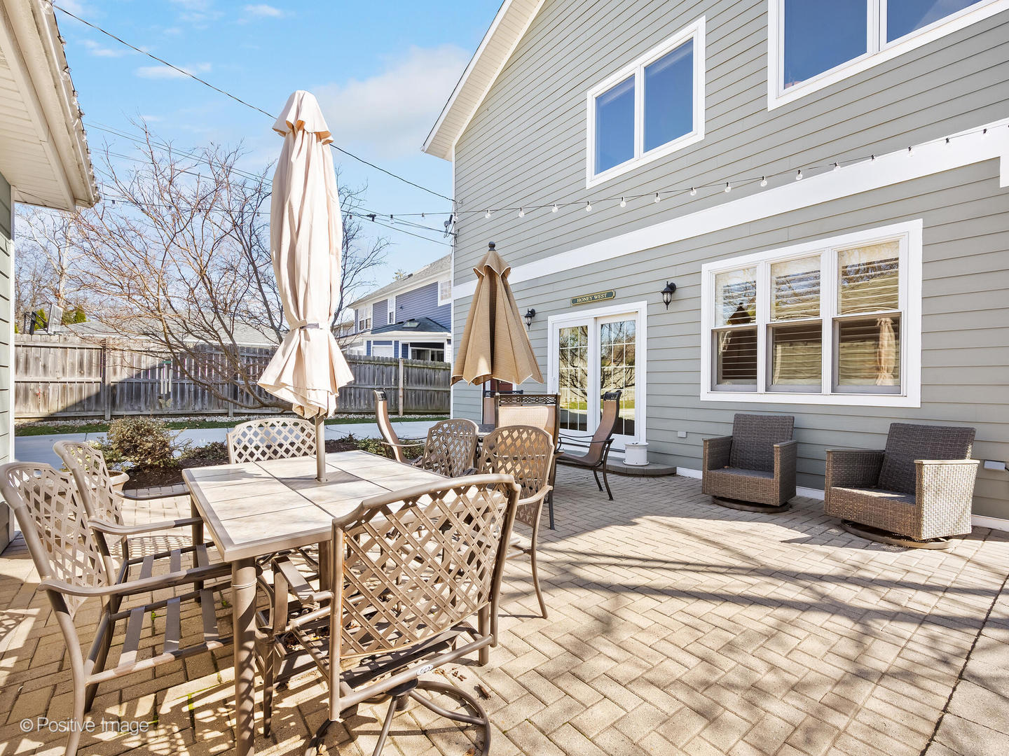 1607 East Indiana Street Wheaton, IL 60187 - Photo 29 of 31 a view of a patio with couches table and chairs and potted plants
