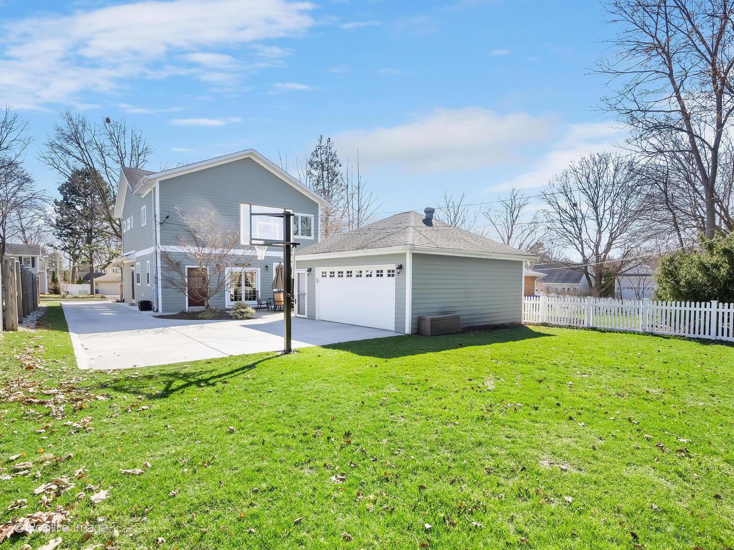 1607 East Indiana Street Wheaton, IL 60187 - Photo 30 of 31 a view of a house with a yard and a large tree
