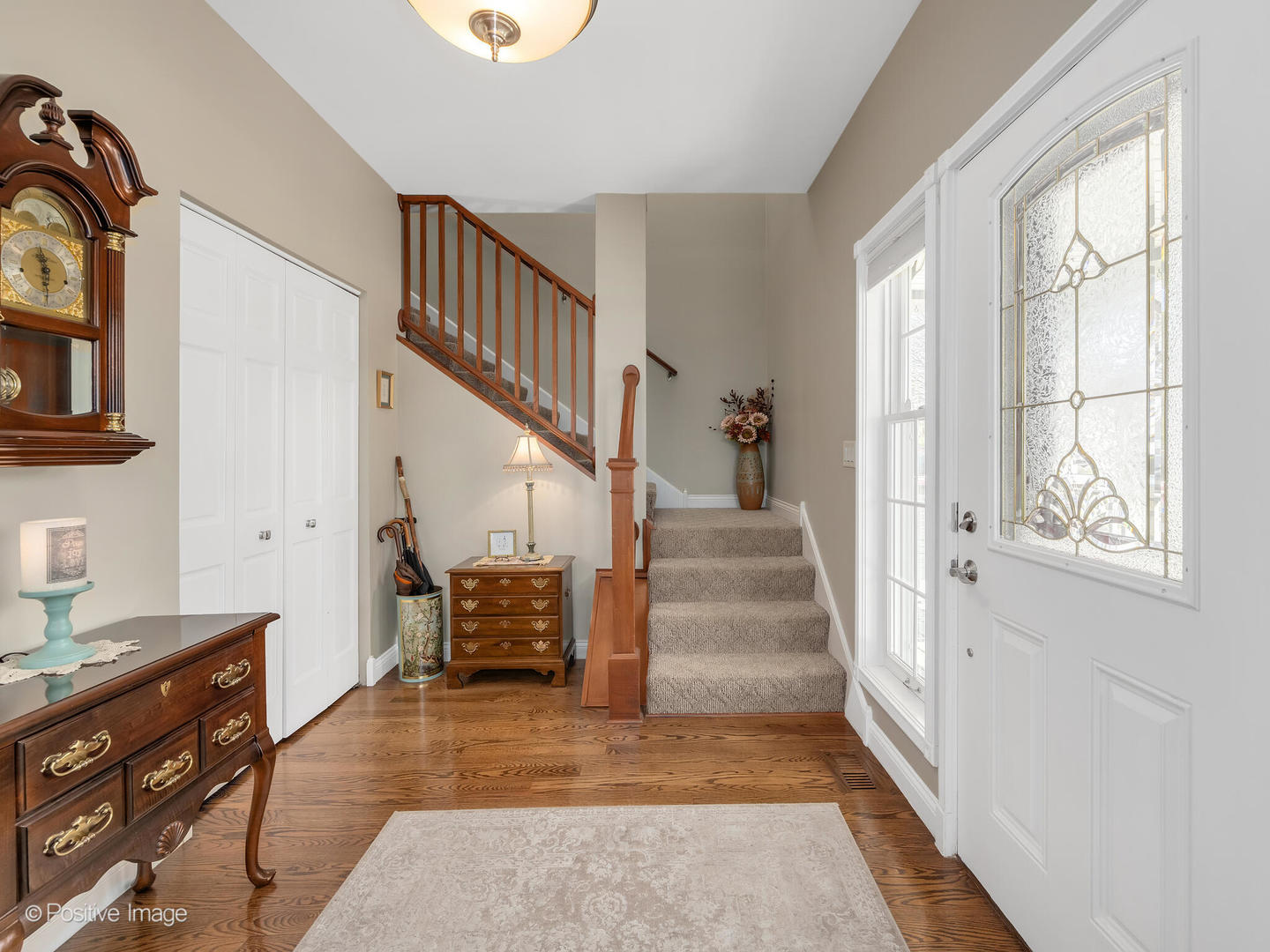 1607 East Indiana Street Wheaton, IL 60187 - Photo 5 of 31 a view of entryway and hall with wooden floor