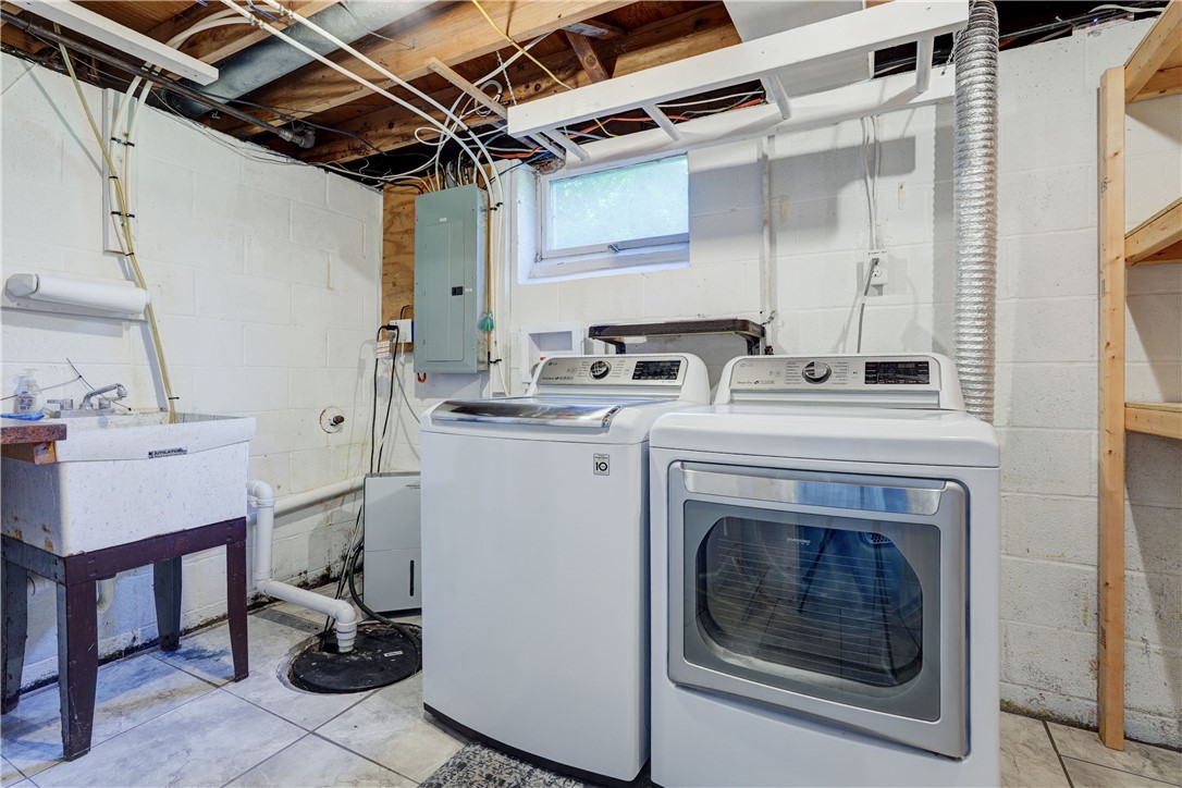 212 Hollybrook Road Sweden, NY 14420 - Photo 33 of 39 Lower level Laundry w/utility tub! Updated panel b
