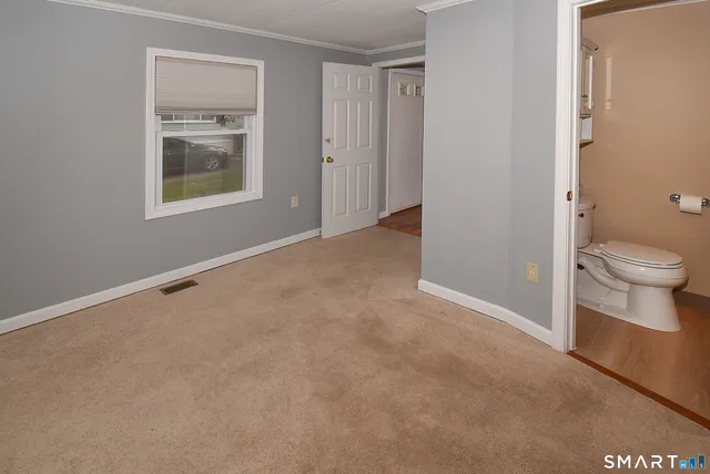 a view of a bathroom with toilet
