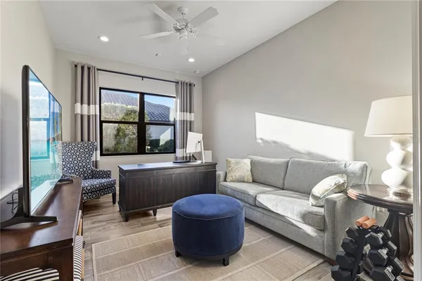 a view of a living room and dining room