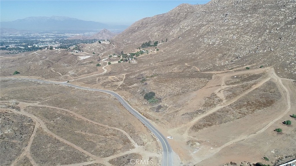 0 Pettegrew Road Riverside, CA 92507 - Photo 2 of 10 a view of a dry yard with wooden fence