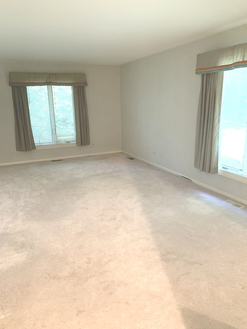 2210 Banbury Road Inverness, IL 60067 - Photo 23 of 41 an empty room with windows