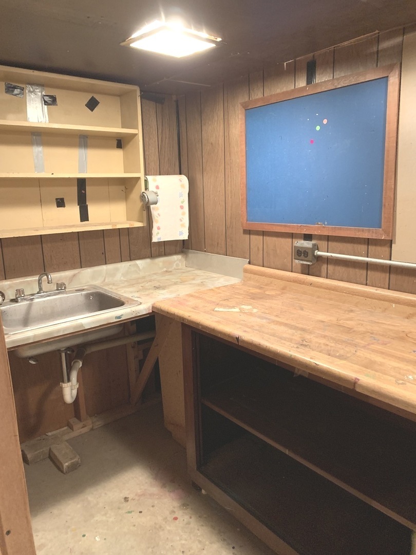 2210 Banbury Road Inverness, IL 60067 - Photo 28 of 41 a bathroom with a sink double vanity and a mirror