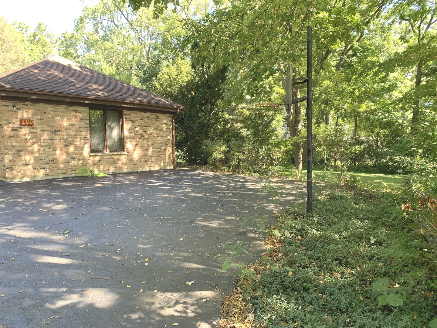 2210 Banbury Road Inverness, IL 60067 - Photo 39 of 41 a view of a house with a tree