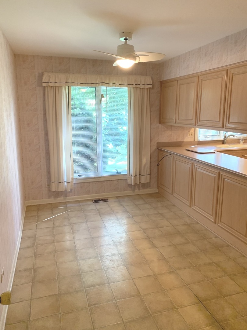 2210 Banbury Road Inverness, IL 60067 - Photo 5 of 41 a view of an empty room with a window