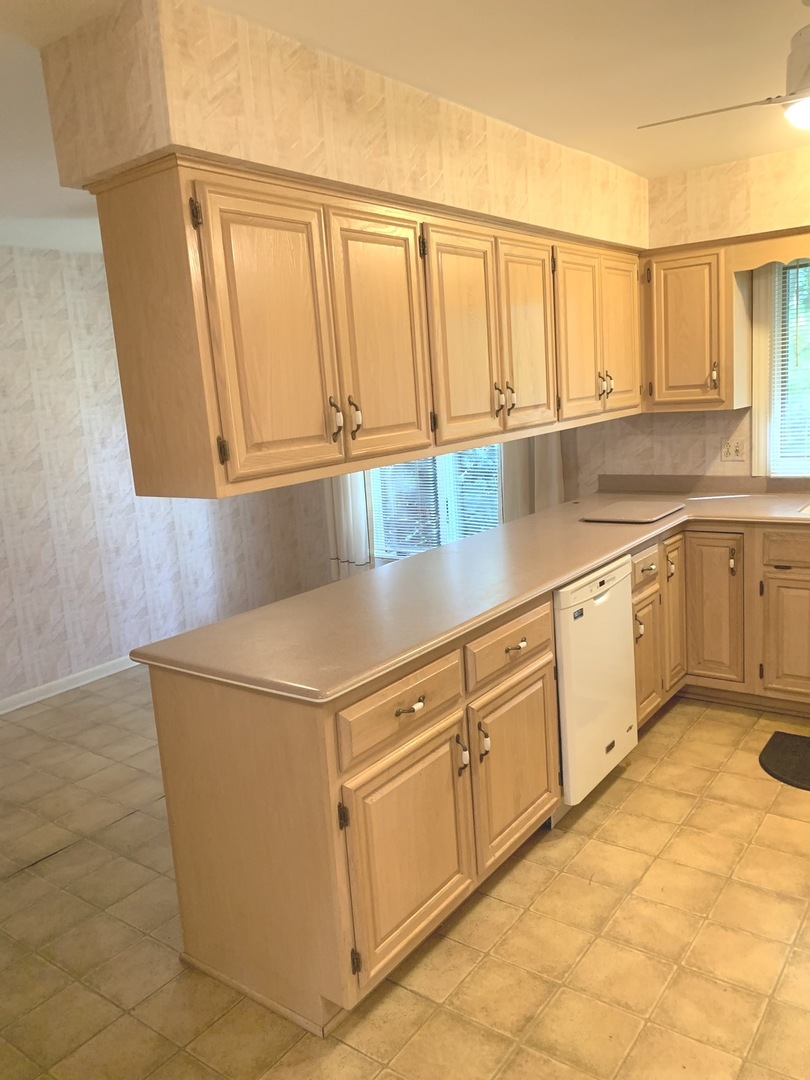 2210 Banbury Road Inverness, IL 60067 - Photo 7 of 41 a utility room with cabinets