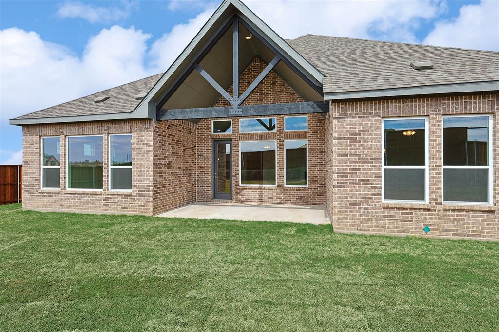 521 Carriage Hl Road Midlothian, TX 76065 - Photo 26 of 26 Rear view of house with a patio, brick siding, and a shingled roof