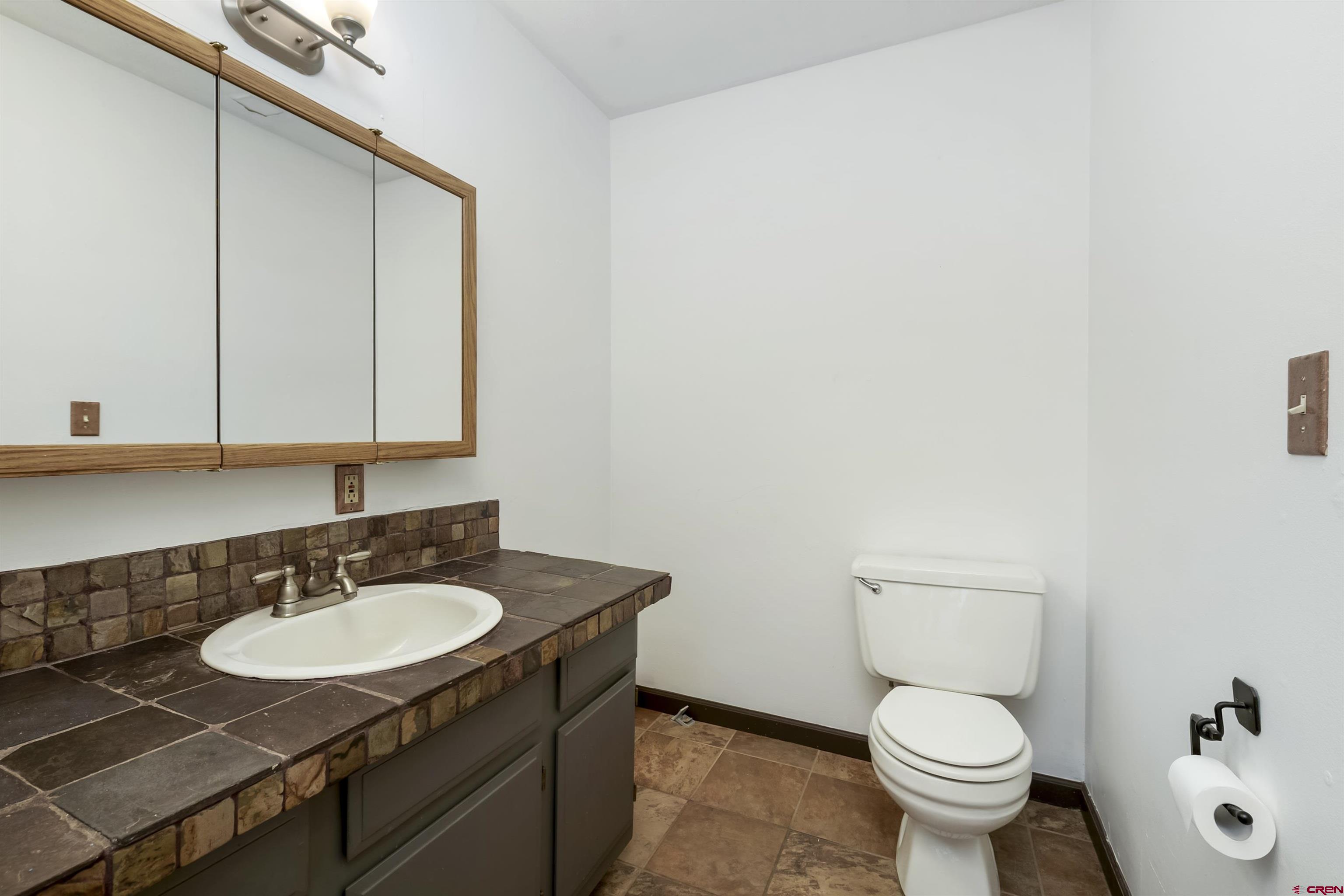 22 Castle Road, Unit 2 Crested Butte, CO 81225 - Photo 11 of 34 a bathroom with a sink and a toilet