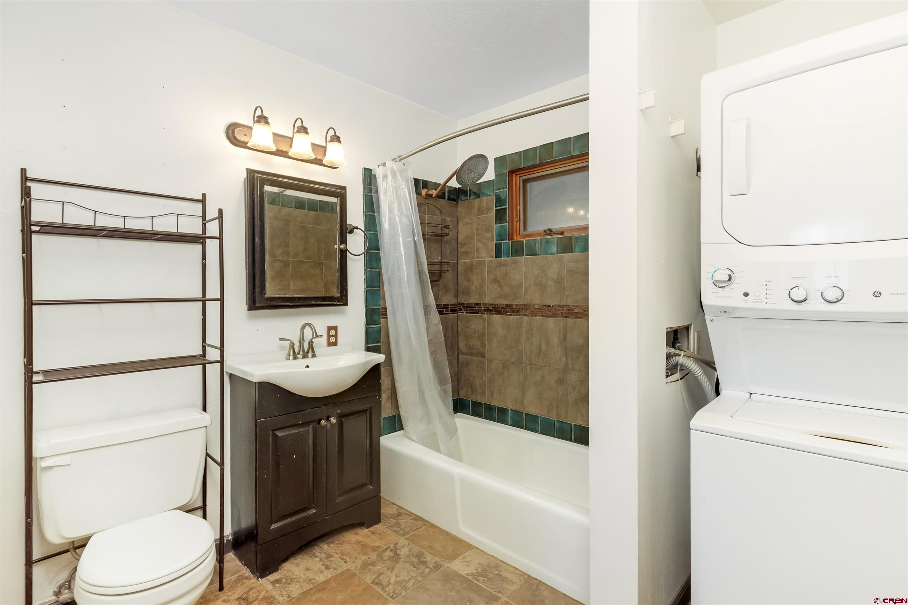 22 Castle Road, Unit 2 Crested Butte, CO 81225 - Photo 25 of 38 a bathroom with a sink a toilet and shower