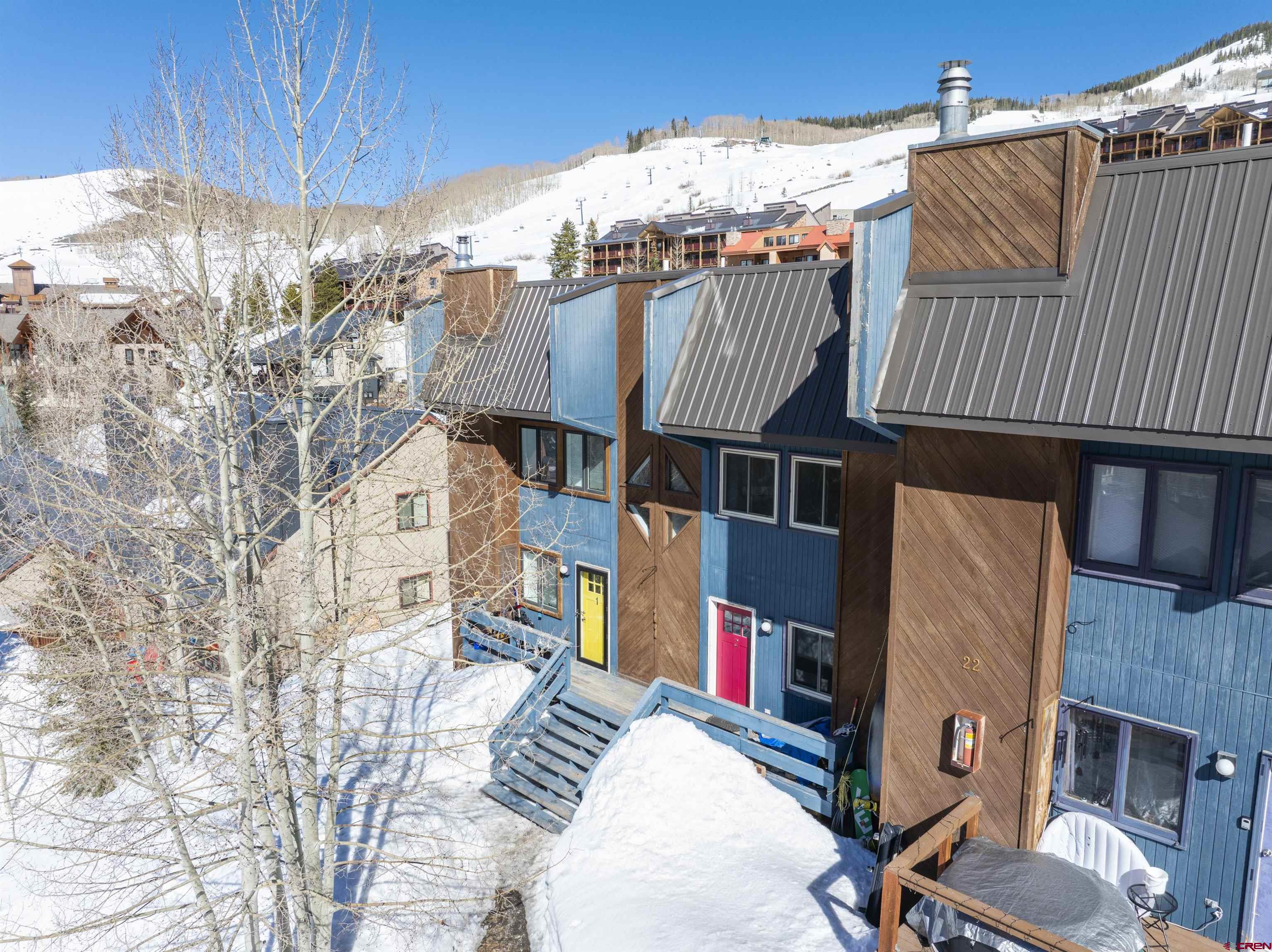 22 Castle Road, Unit 2 Crested Butte, CO 81225 - Photo 3 of 38 a view of roof deck with wooden fence