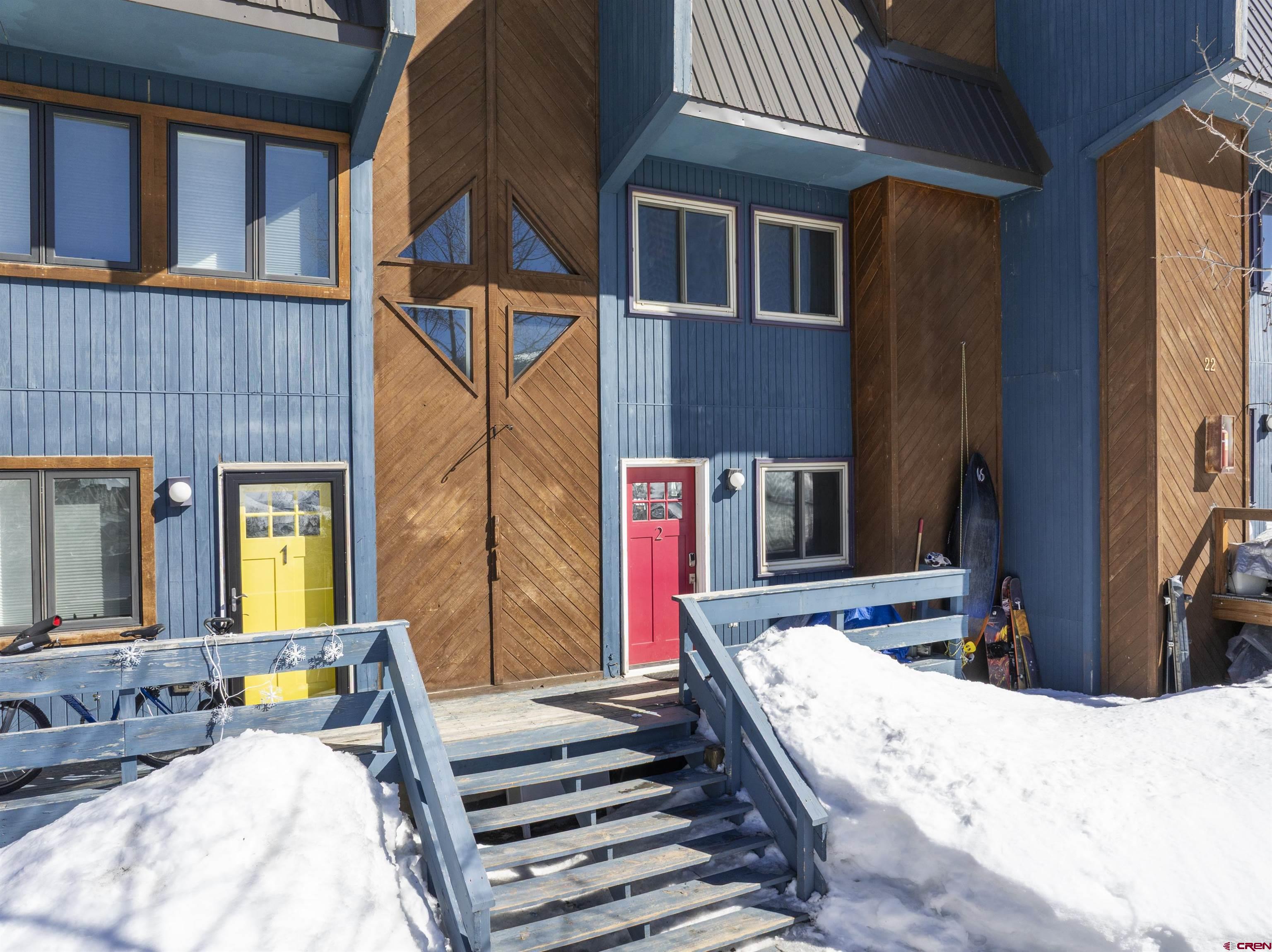 22 Castle Road, Unit 2 Crested Butte, CO 81225 - Photo 3 of 34 a view of a house with a couches and wooden floor