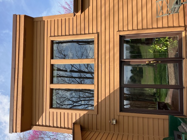 2066 Tolbert Road Hamilton, OH 45011 - Photo 7 of 63 This exterior view showcases sleek wood siding and expansive windows with outdoor access.