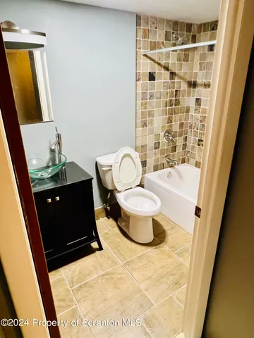 a bathroom with a toilet